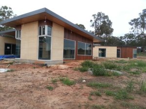 Rammed Earth is an excellent low carbon, humidity regulating thermal mass that works well with solar passive design. 